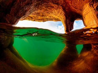 underwater view of a sea cave on bear island in the apostle islands in wisconsin