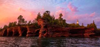 devil's island lighthouse during an amazing sunrise in the apostle islands national lakeshore