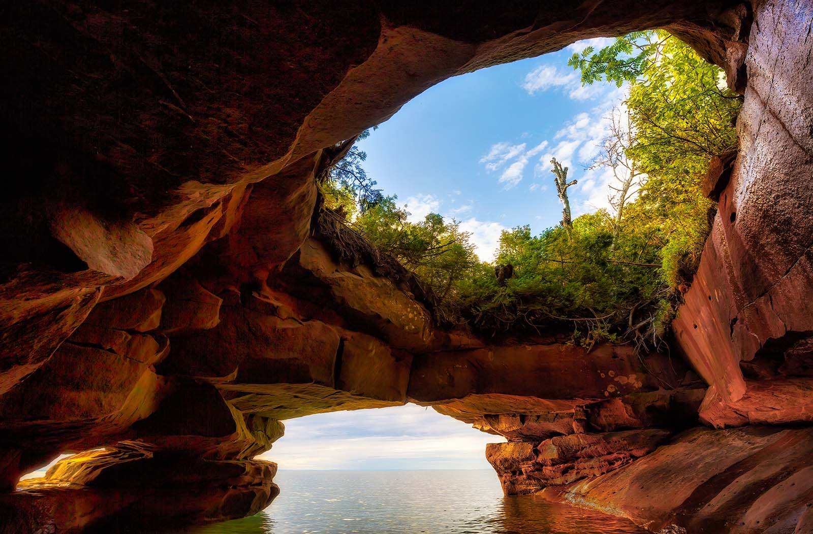 sandstone sea cave with open ceiling on bear island in the apostle islands