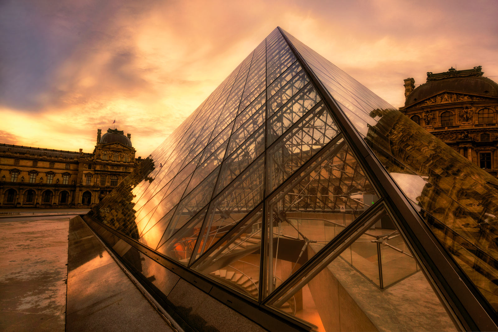 stormy sunrise at the lourve in paris france